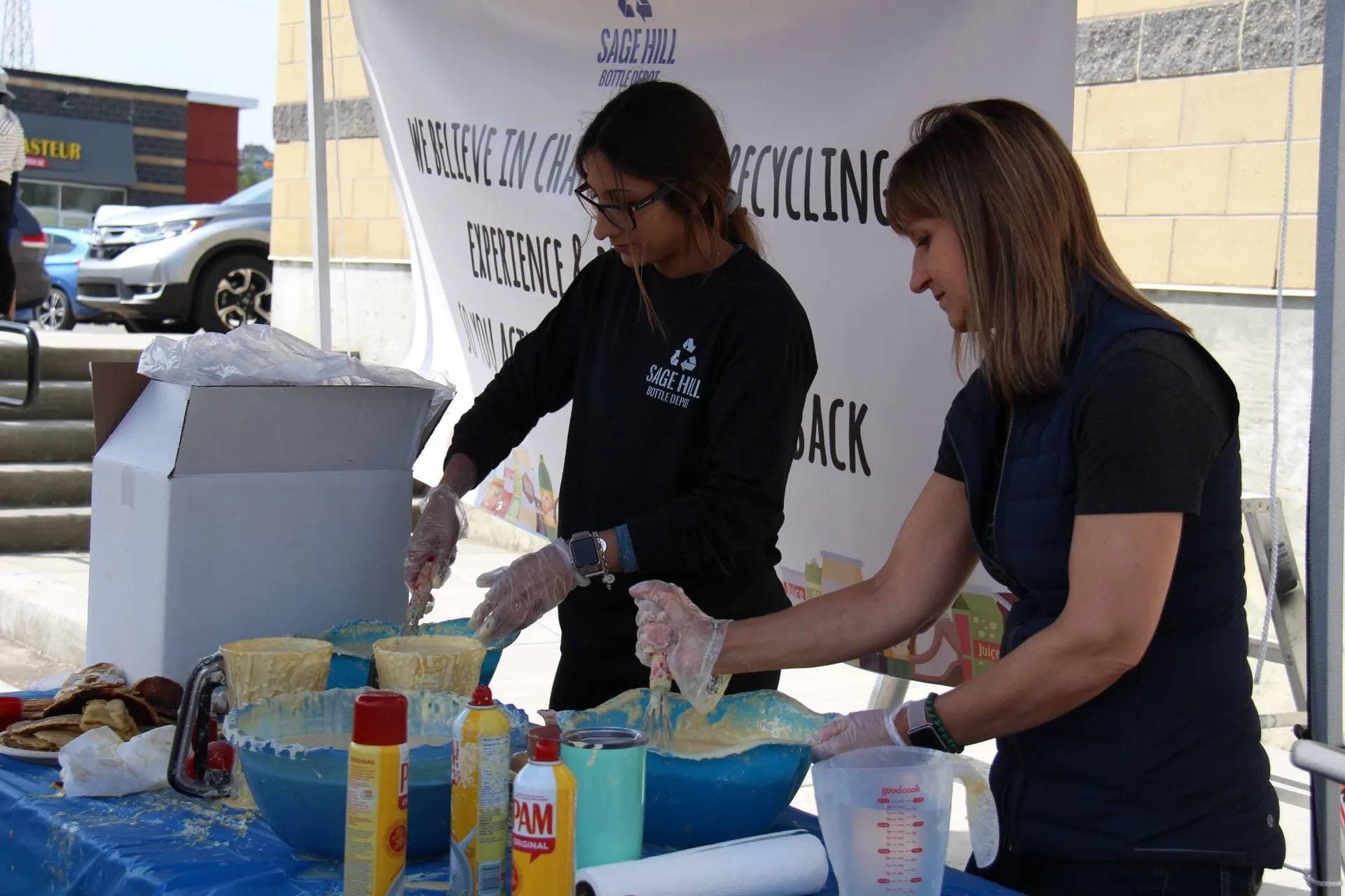 Sage Hill Bottle Depot staff at a NW Calgary community event
